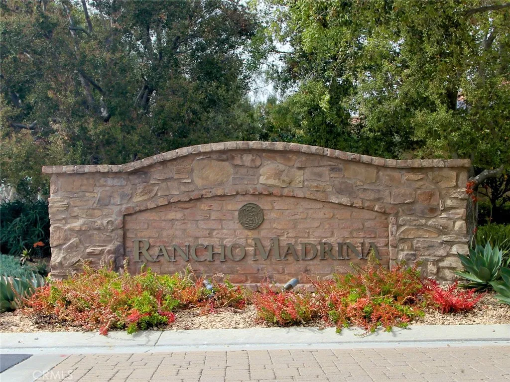 Nestled within the prestigious Rancho Madrina community, surrounded by scenic hillsides and estate residences.