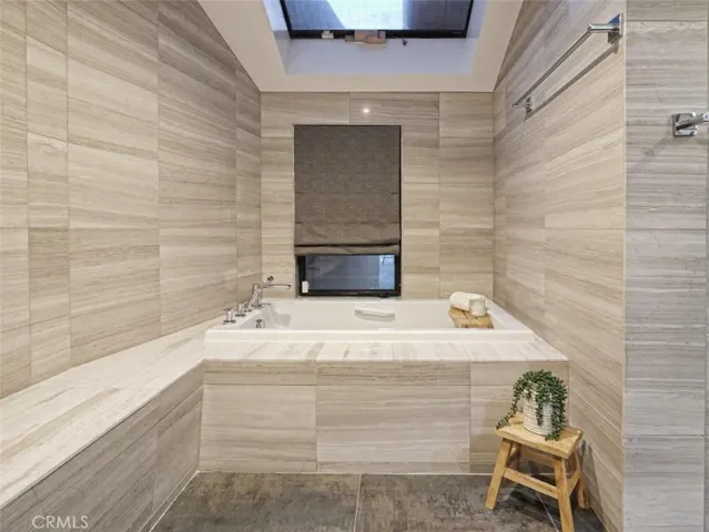 Enclosed Shower & Tub in Primary Bathroom
