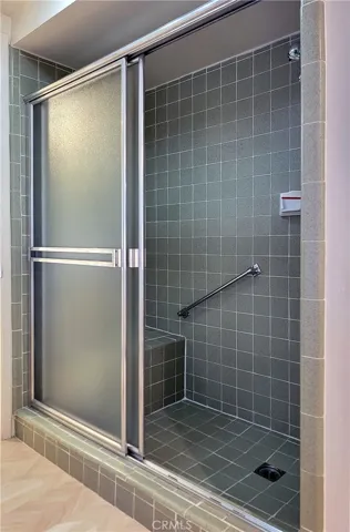 Tiled shower in Jack and Jill bathroom