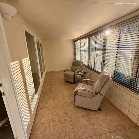 Enclosed patio- virtually staged