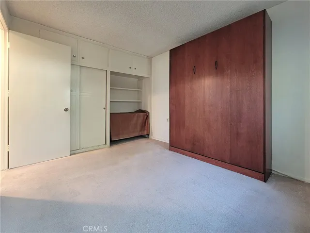 Second bedroom with murphy bed & office space