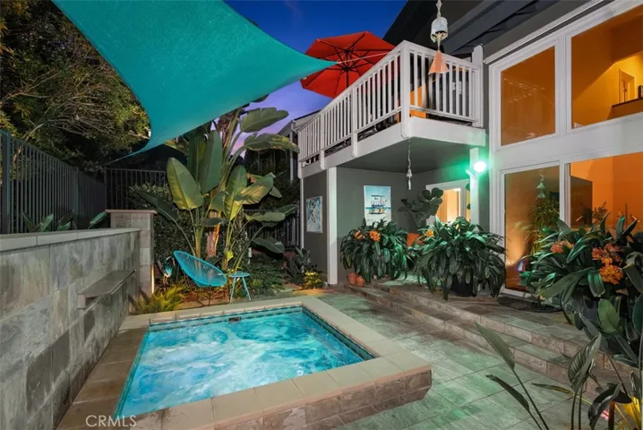 Backyard Spa with Waterfall Feature