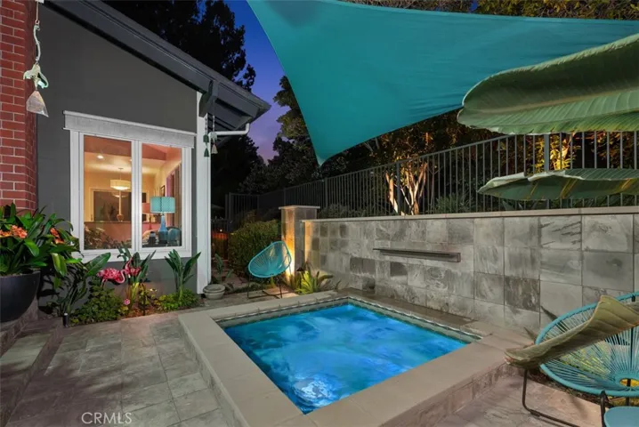 Backyard Spa with Waterfall Feature