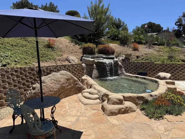 Front waterfall and pond.