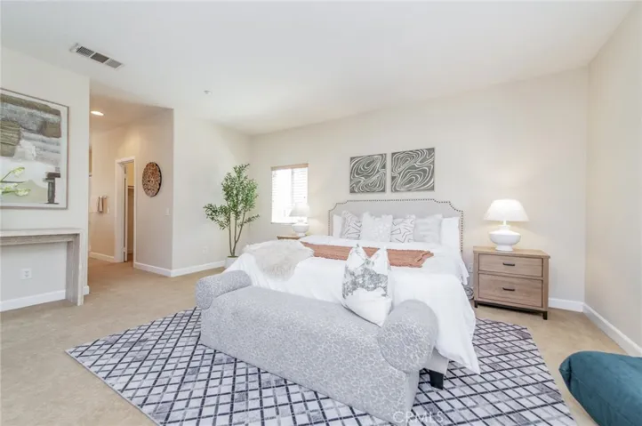 the luxurious primary suite serves as a private retreat