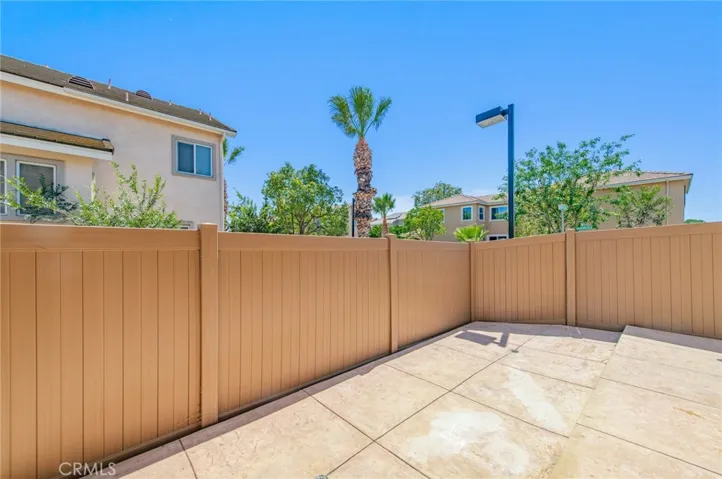 Low-maintenance paved back yard & side yard