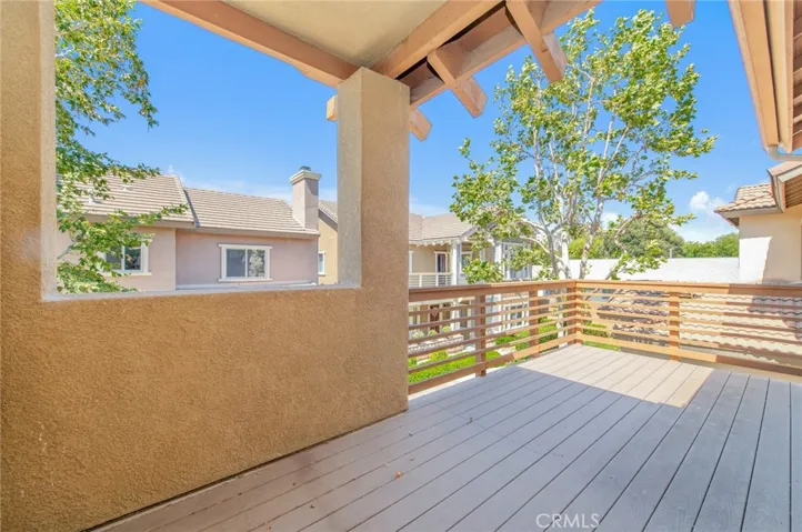 Spacious covered balcony off the master suite