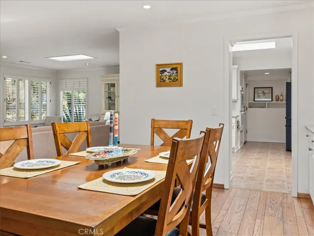 The dining room is open to both the living room and kitchen.
