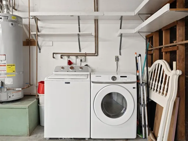 The laundry room is right outside the kitchen door, in the 4 car garage.