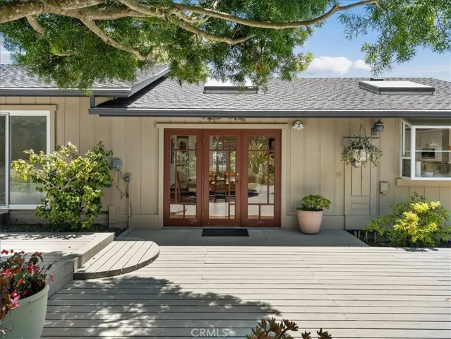 The French doors enter into the dining area.