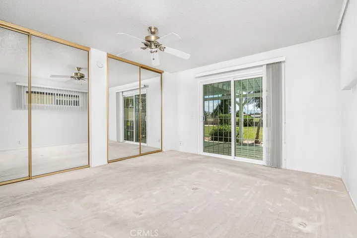2 closet wardrobes and slider to enjoy back patio and views