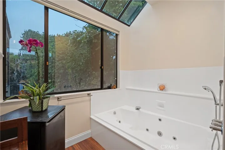 Primary bath overlooks the backyard