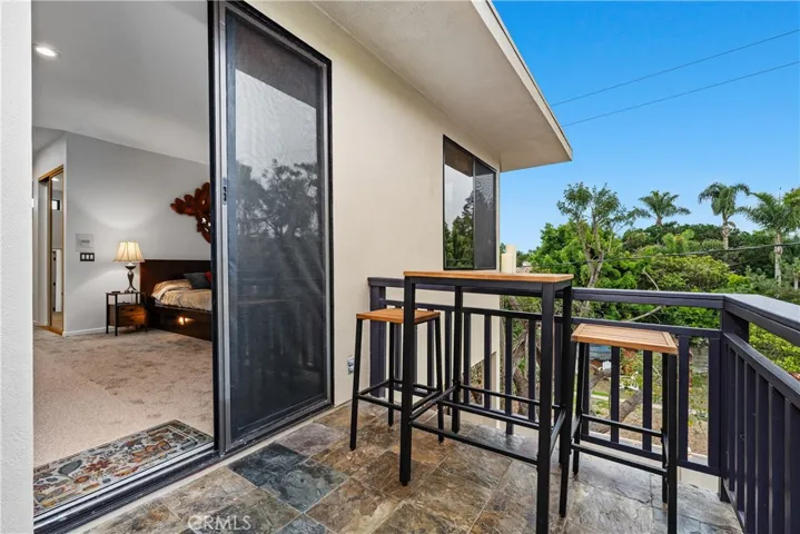 Primary Balcony overlooks the pool