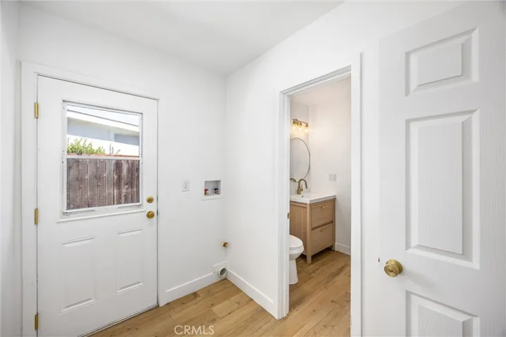 Roomy laundry room off of the kitchen and an brand new bathroom with shower.