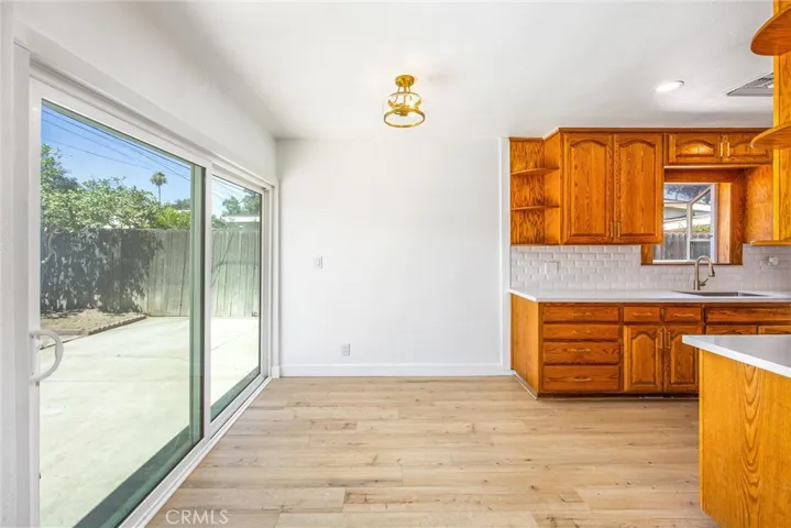 Large dual pane slider off the kitchen - plenty of room for kitchen table.