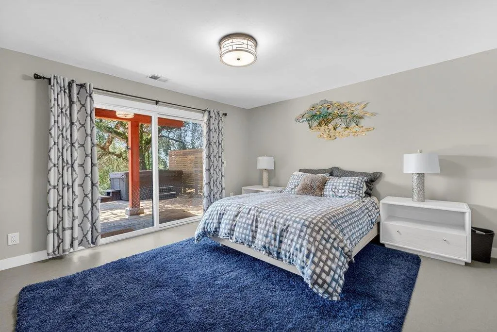 Bedroom 4 on lower family room level.  Lower level doubles as guest/teen apartment or in-law quarter