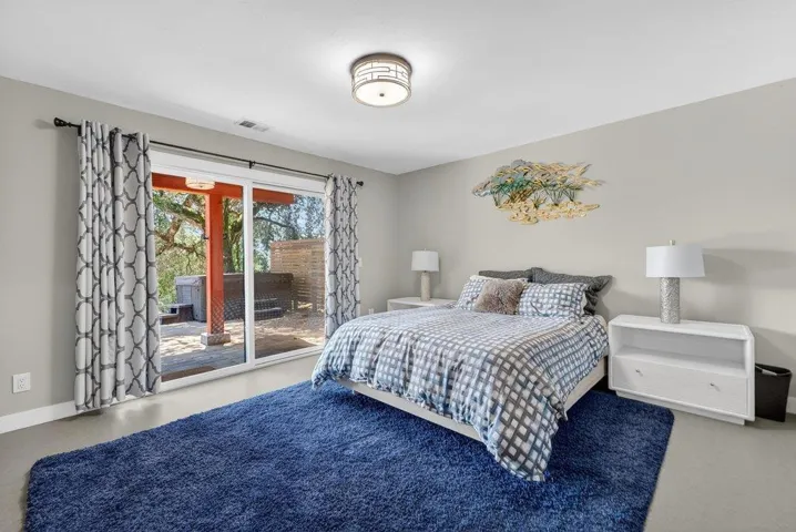 Bedroom 4 on lower family room level.  Lower level doubles as guest/teen apartment or in-law quarter