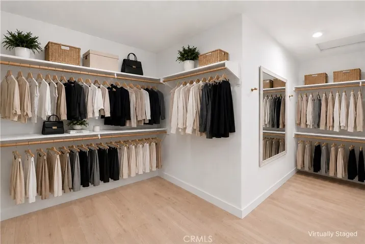 Expansive Walk-In Closet.  Disclaimer: This room has been virtually staged
