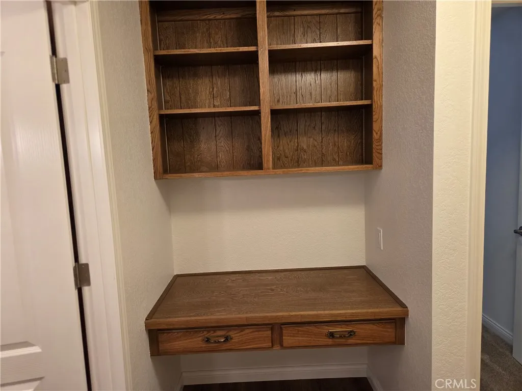 Desk area and shelves