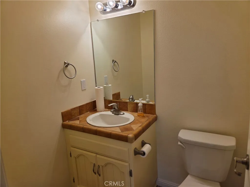 Half bathroom off kitchen