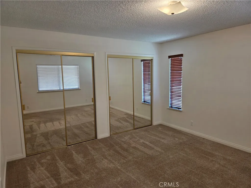 Front Bedroom with sliding glass doors