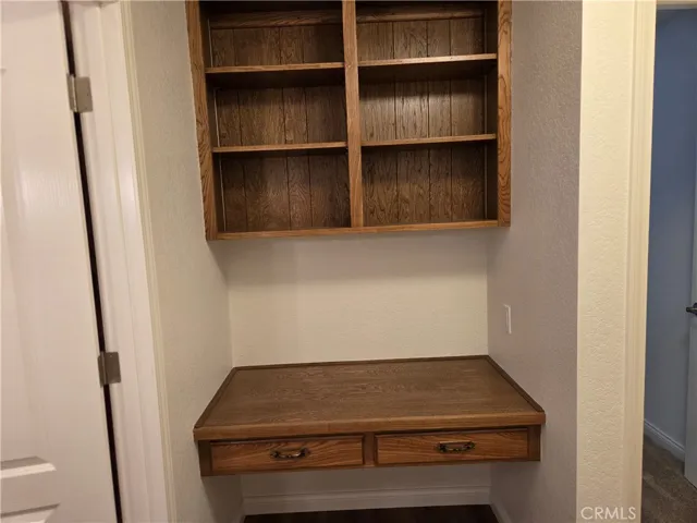 Desk area and shelves
