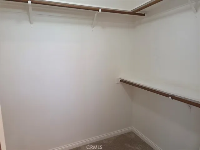 Walk in closet with view to right