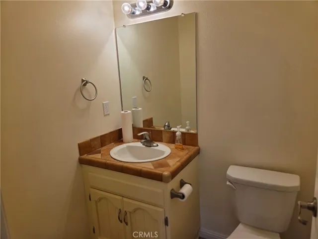 Half bathroom off kitchen