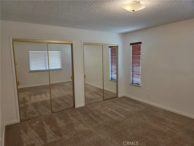 Front Bedroom with sliding glass doors