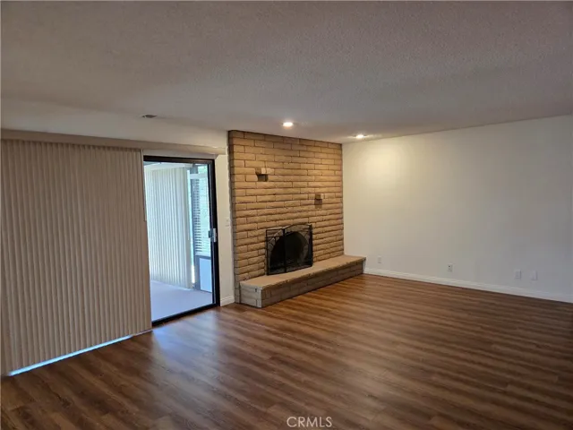 Family room with slider door to large enclosed patio