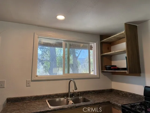 Kitchen overlooking horse shoe pit