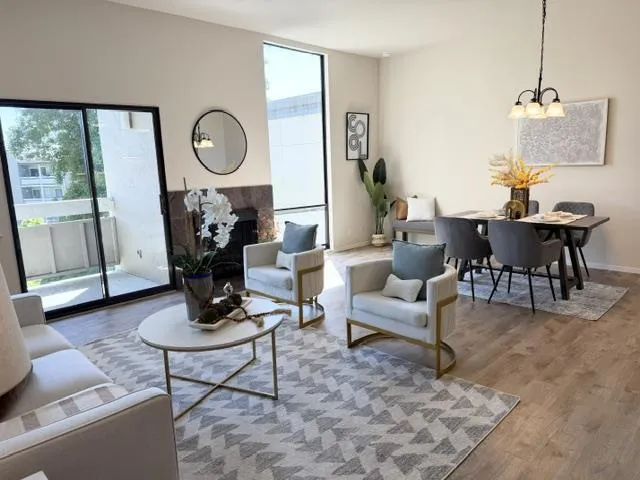 Living room and dining room with high ceiling