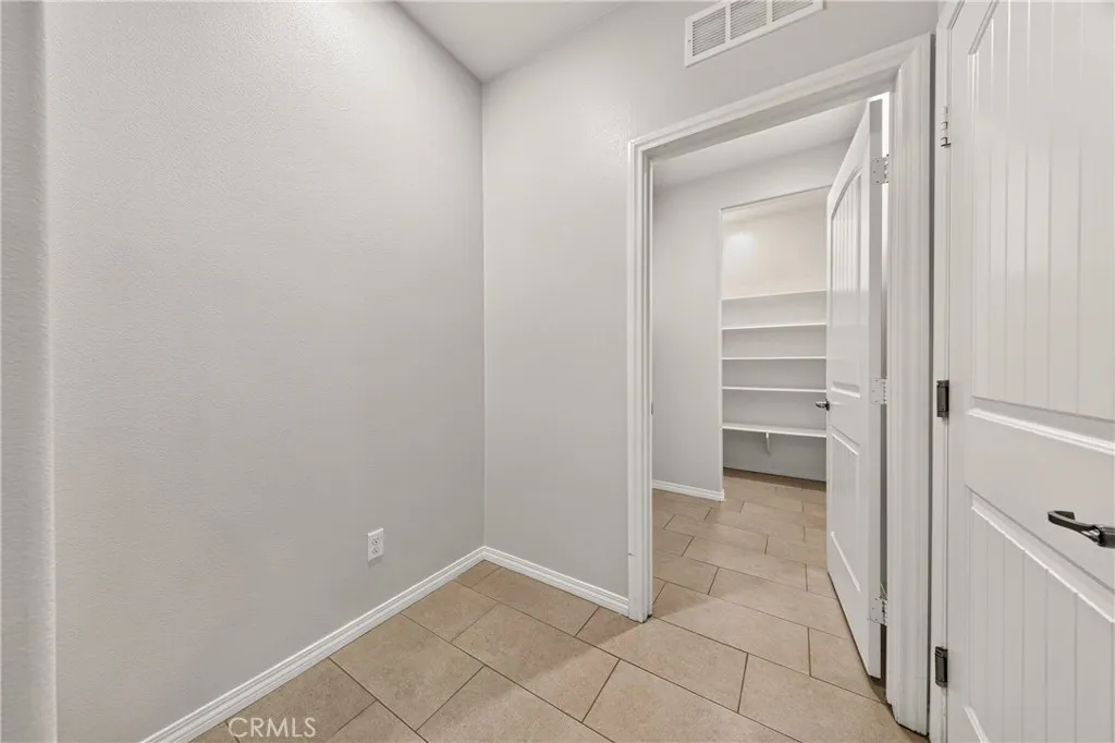 Hallway With Linen Storage