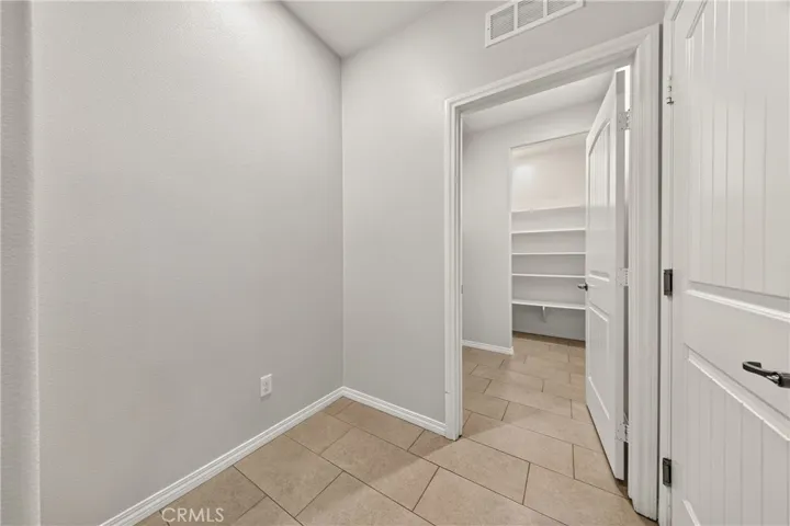 Hallway With Linen Storage
