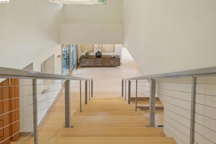 Hardwood stairs with cable railing system