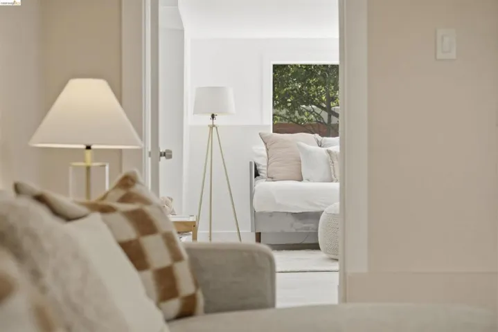 Clean white walls and light-toned flooring create a bright interior