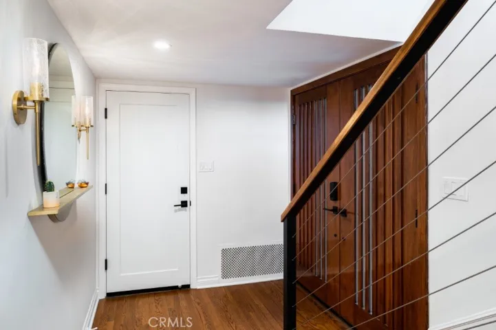 Entry with Custom Stairwell, Door, Railings & More!