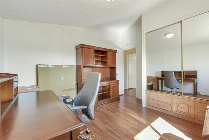 Guest bedroom 3 with mirrored closet doors