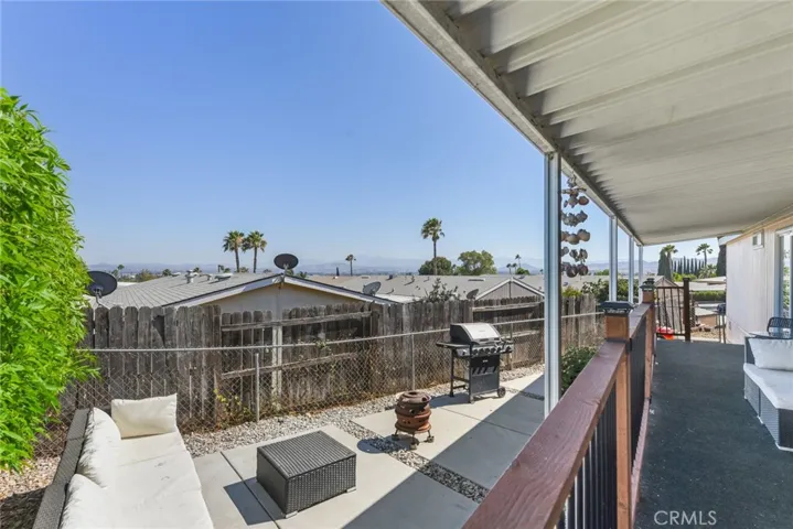Rear patio with view and BBQ area