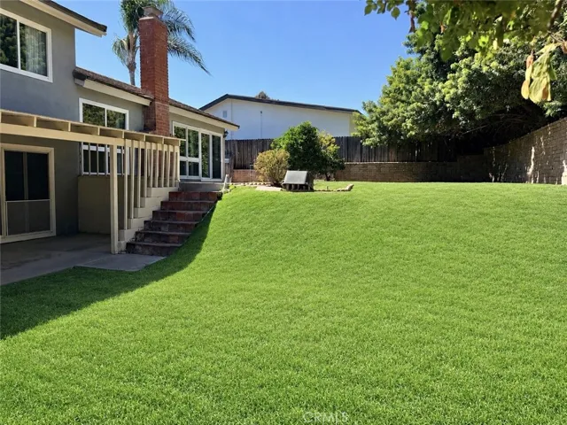 Lower backyard with covered patio