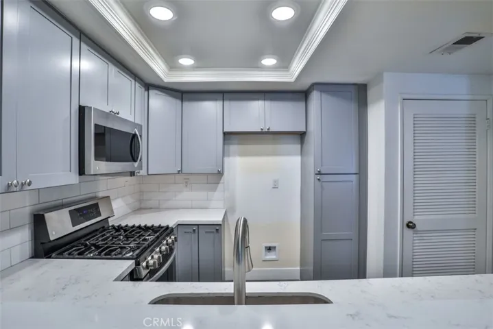 Kitchen opens to dining room.