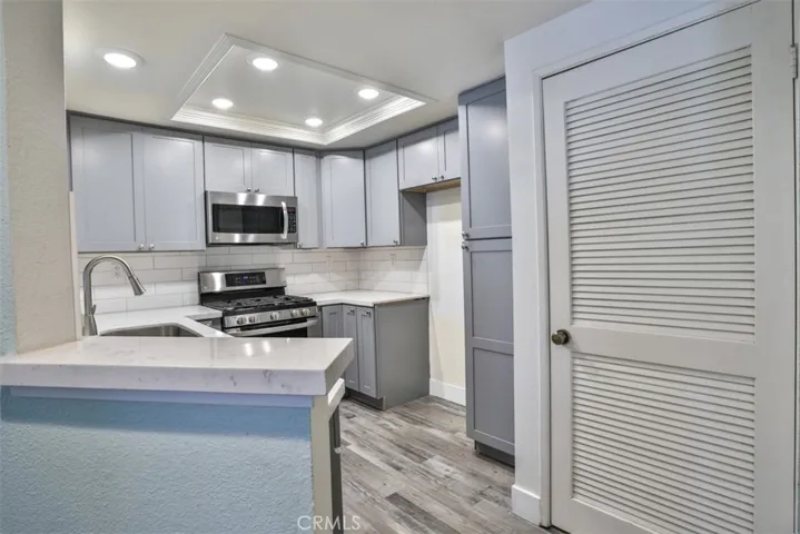 Kitchen opens to dining room.