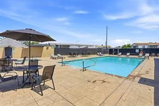 Enjoy outdoor areas with pool, hot tub & shaded tables!