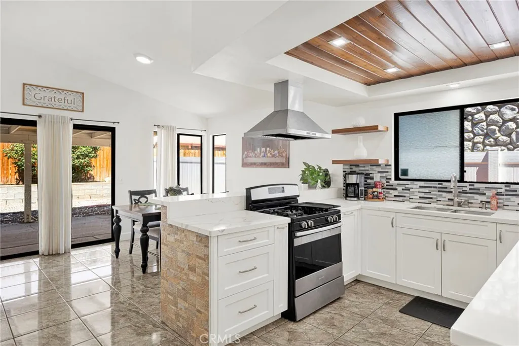 Open kitchen with counter space for barstools