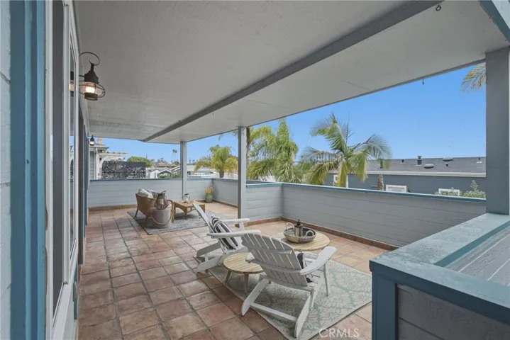 Second-floor patio entry to the home
