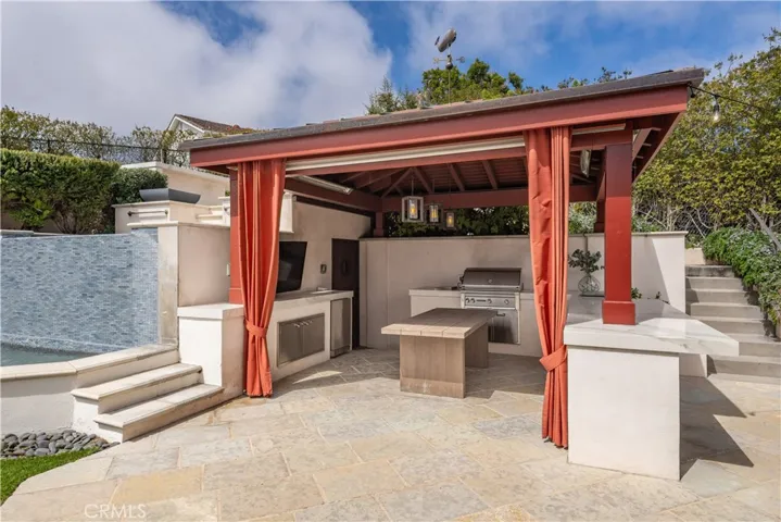 Cabana with outdoor kitchen, BBQ and TV