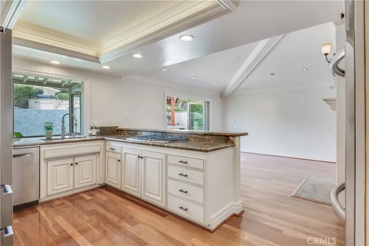 Remodeled kitchen with garden window and recessed ceiling
