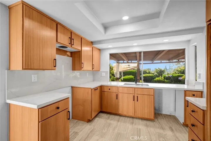 Kitchen where stove and range would go