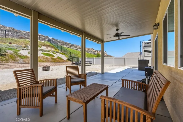 covered patio on slab with views of open space and mountains quiet and private