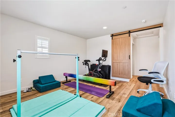 bonus room with sliding barn door